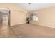 Bright dining room with vaulted ceiling and carpet flooring at 2304 E Aire Libre Ave, Phoenix, AZ 85022