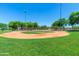 Well-maintained baseball field, perfect for recreational activities within the community at 26001 W Matthew Dr, Buckeye, AZ 85396