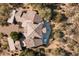 Bird's-eye view of a sprawling estate with unique rooflines at 27939 N 100Th Pl, Scottsdale, AZ 85262