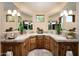 Spa-like bathroom with double vanities and large mirrors at 27939 N 100Th Pl, Scottsdale, AZ 85262