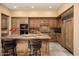 Spacious kitchen with large island and stainless steel appliances at 27939 N 100Th Pl, Scottsdale, AZ 85262