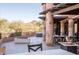 Large patio with hot tub, fire pit, and mountain views at 27939 N 100Th Pl, Scottsdale, AZ 85262