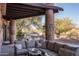 Relaxing patio with sectional sofa and views of the backyard at 27939 N 100Th Pl, Scottsdale, AZ 85262