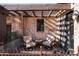 Small patio with two chairs and a side table at 27939 N 100Th Pl, Scottsdale, AZ 85262