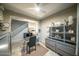 Spacious home office with desk and view of staircase at 2811 E Dunbar Dr, Phoenix, AZ 85042