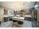 Open kitchen features stainless steel appliances and an island at 2811 E Dunbar Dr, Phoenix, AZ 85042