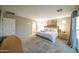 Main bedroom with a king bed, en-suite bathroom access at 2811 E Dunbar Dr, Phoenix, AZ 85042