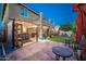 Outdoor patio area with pergola, bar and seating area at 2811 E Dunbar Dr, Phoenix, AZ 85042