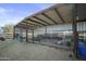 Covered animal shelter with wire fencing and hay bales at 28667 N Hundley Hts, San Tan Valley, AZ 85144