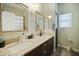 Well-appointed bathroom with double sinks and granite countertops at 28667 N Hundley Hts, San Tan Valley, AZ 85144