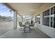 Patio furniture on covered patio with mountain views at 28667 N Hundley Hts, San Tan Valley, AZ 85144