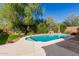 Inviting swimming pool in a landscaped backyard at 2944 E Shady Spring Trl, Phoenix, AZ 85024