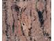 Aerial view of a large desert lot at 30314 W Wildcat Dr, Wittmann, AZ 85361