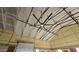 High ceiling with exposed beams and insulation at 30314 W Wildcat Dr, Wittmann, AZ 85361