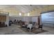 Open concept interior of a large barn with high ceilings at 30314 W Wildcat Dr, Wittmann, AZ 85361