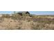 Aerial view of property with desert landscape at 30314 W Wildcat Dr, Wittmann, AZ 85361