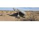 Ground mounted solar panel and satellite dish at 30314 W Wildcat Dr, Wittmann, AZ 85361