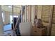 Unfinished storage room with exposed framing at 30314 W Wildcat Dr, Wittmann, AZ 85361