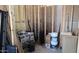 Unfinished storage room with building materials at 30314 W Wildcat Dr, Wittmann, AZ 85361