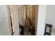 Unfinished storage area with various boxes and items at 30314 W Wildcat Dr, Wittmann, AZ 85361