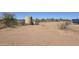 Large water tank and plumbing infrastructure at 30314 W Wildcat Dr, Wittmann, AZ 85361