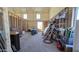 Unfinished workshop with high ceilings at 30314 W Wildcat Dr, Wittmann, AZ 85361