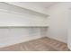 Spacious walk-in closet with double rods and ample shelving at 39813 N Staman St, San Tan Valley, AZ 85140