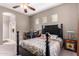 Spacious bedroom with large bed and access to the bathroom at 42424 N Gavilan Peak Pkwy # 42206, Anthem, AZ 85086