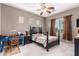 Bright bedroom with a comfortable bed and built-in desk at 42424 N Gavilan Peak Pkwy # 42206, Anthem, AZ 85086