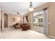 Open living area with access to balcony at 42424 N Gavilan Peak Pkwy # 42206, Anthem, AZ 85086