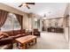 Spacious living room with leather furniture at 42424 N Gavilan Peak Pkwy # 42206, Anthem, AZ 85086