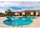 Relaxing community pool with ample lounge chairs at 42424 N Gavilan Peak Pkwy # 42206, Anthem, AZ 85086