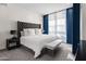 Spacious Primary bedroom with plush bed and large windows at 4739 N Scottsdale Rd # 2002, Scottsdale, AZ 85251
