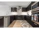 Modern kitchen with stainless steel appliances and wood flooring at 4739 N Scottsdale Rd # 2002, Scottsdale, AZ 85251