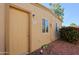 Tan stucco exterior with private entrance and landscaping at 4754 N 14Th St, Phoenix, AZ 85014