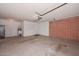 Garage interior with automatic opener and storage at 5732 W Vogel Ave, Glendale, AZ 85302