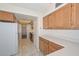 Kitchen with wood cabinets, tile floor, and stainless steel appliances at 5732 W Vogel Ave, Glendale, AZ 85302