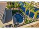 Relaxing freeform pool with lush landscaping and lake view at 660 E Riviera Dr, Chandler, AZ 85249