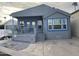 Inviting home exterior featuring a covered deck and well-manicured landscaping at 713 Merlin --, Mesa, AZ 85205