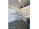 Laundry room with stackable washer and dryer at 713 Merlin --, Mesa, AZ 85205