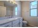 Bathroom with single vanity and toilet at 9443 W Melinda Ln, Peoria, AZ 85382