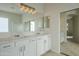 Double vanity bathroom with marble countertops at 9443 W Melinda Ln, Peoria, AZ 85382