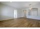 Formal dining room with wood-look floors and views to entry at 9443 W Melinda Ln, Peoria, AZ 85382