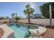 Inviting backyard pool and spa with storage shed at 9443 W Melinda Ln, Peoria, AZ 85382