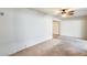 Living room with ceiling fan and access to other rooms at 10542 W Echo Ln, Peoria, AZ 85345