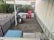 Small backyard with grill, chairs, and gravel at 11411 N 91St Ave # 156, Peoria, AZ 85345