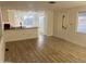 Modern kitchen with island and light wood flooring at 11411 N 91St Ave # 156, Peoria, AZ 85345