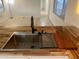 New kitchen sink and butcher block countertop at 11411 N 91St Ave # 156, Peoria, AZ 85345