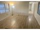Spacious living room with light wood flooring at 11411 N 91St Ave # 156, Peoria, AZ 85345