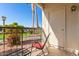 Private patio with seating and a view of the landscaped grounds at 14145 N 92Nd St # 1008, Scottsdale, AZ 85260